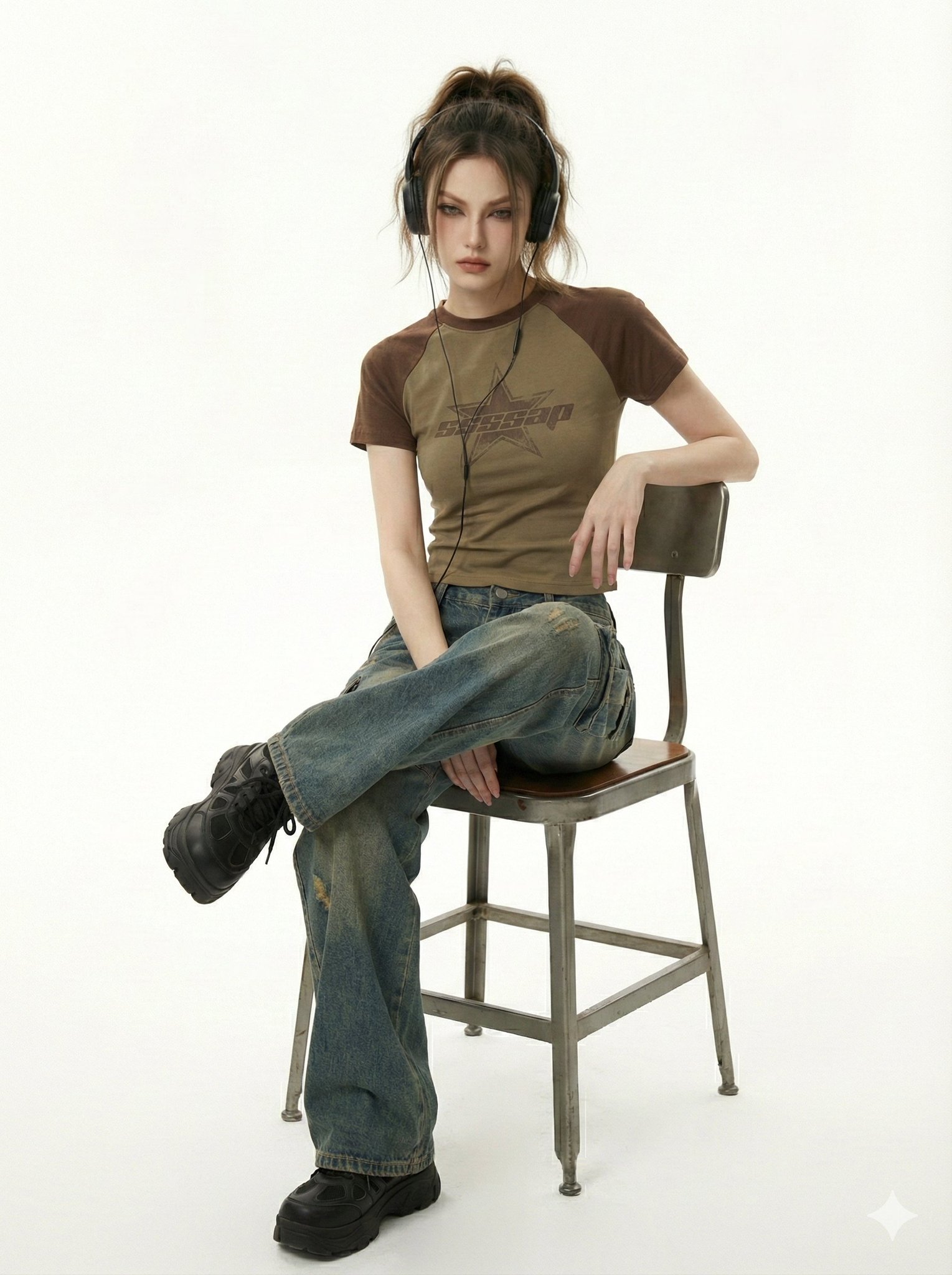 She kneels in a pristine white studio, shot from a low mid an...